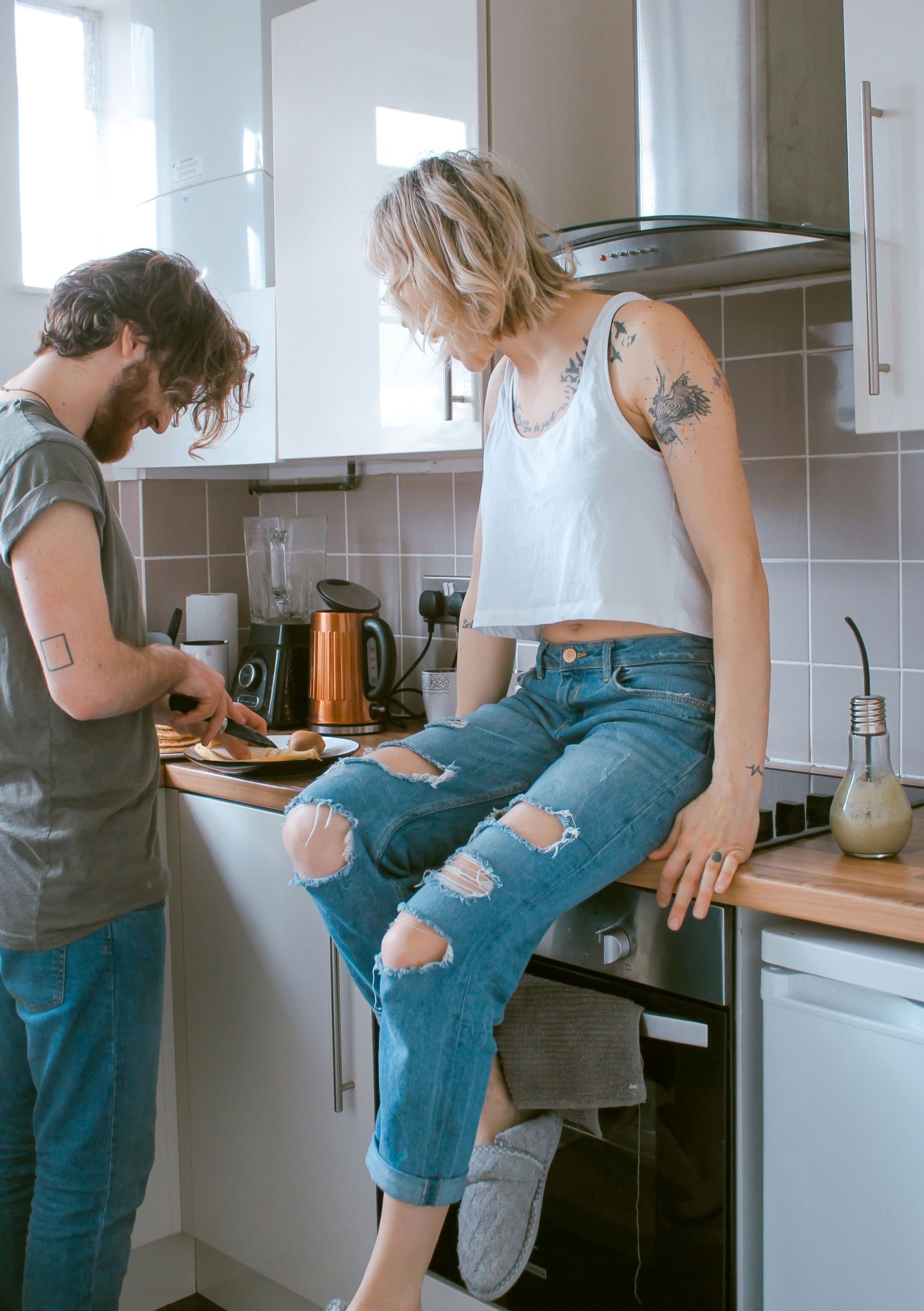 Couple preparing food in a kitchen